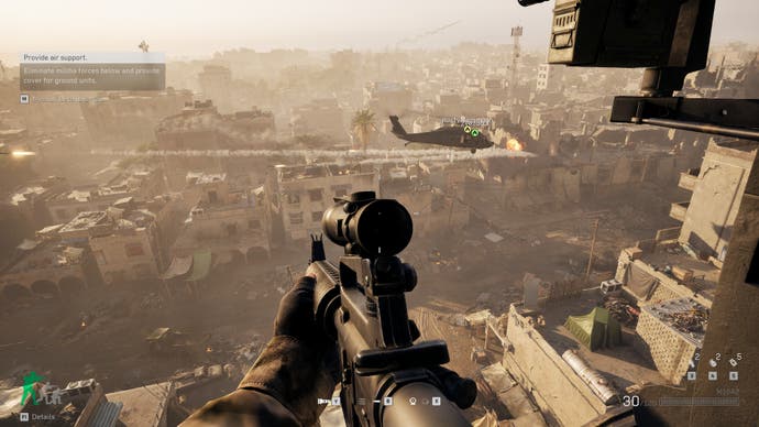 A screenshot of Delta Force, showing the player looking out of a helicopter as it flies over Mogadishu in the Black Hawk Down campaign.