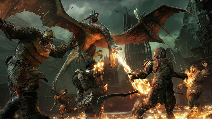 Shadow of War screenshot showing the player characer riding a fire-breathing beast over cowering orcs and trolls.