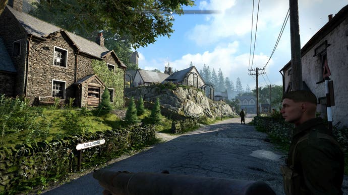 A screenshot of Atomfall running on PS5 Pro showing a picturesque rural English village from the 1960s.