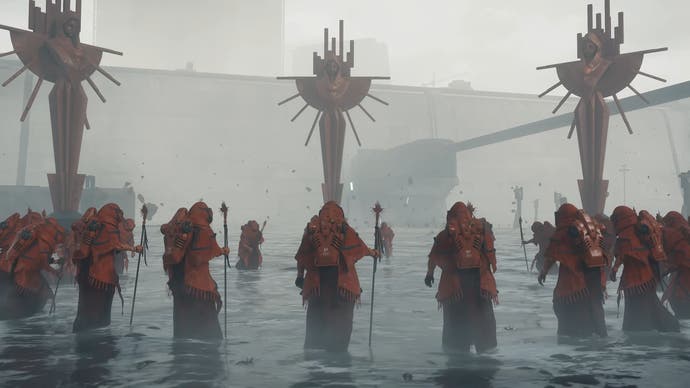 Death Stranding 2 trailer screenshot showing mysterious cult in orange futuristic suits stood in water