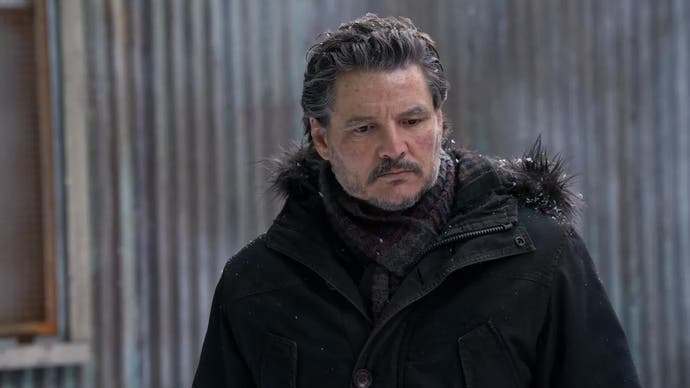 Pedro Pascal as Joel in second season of TLOU. He is outside in a large winter coat.