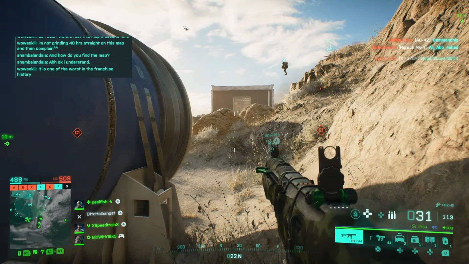 State of the Game Battlefield 2042 - camping between a structure and some beige rocky hills