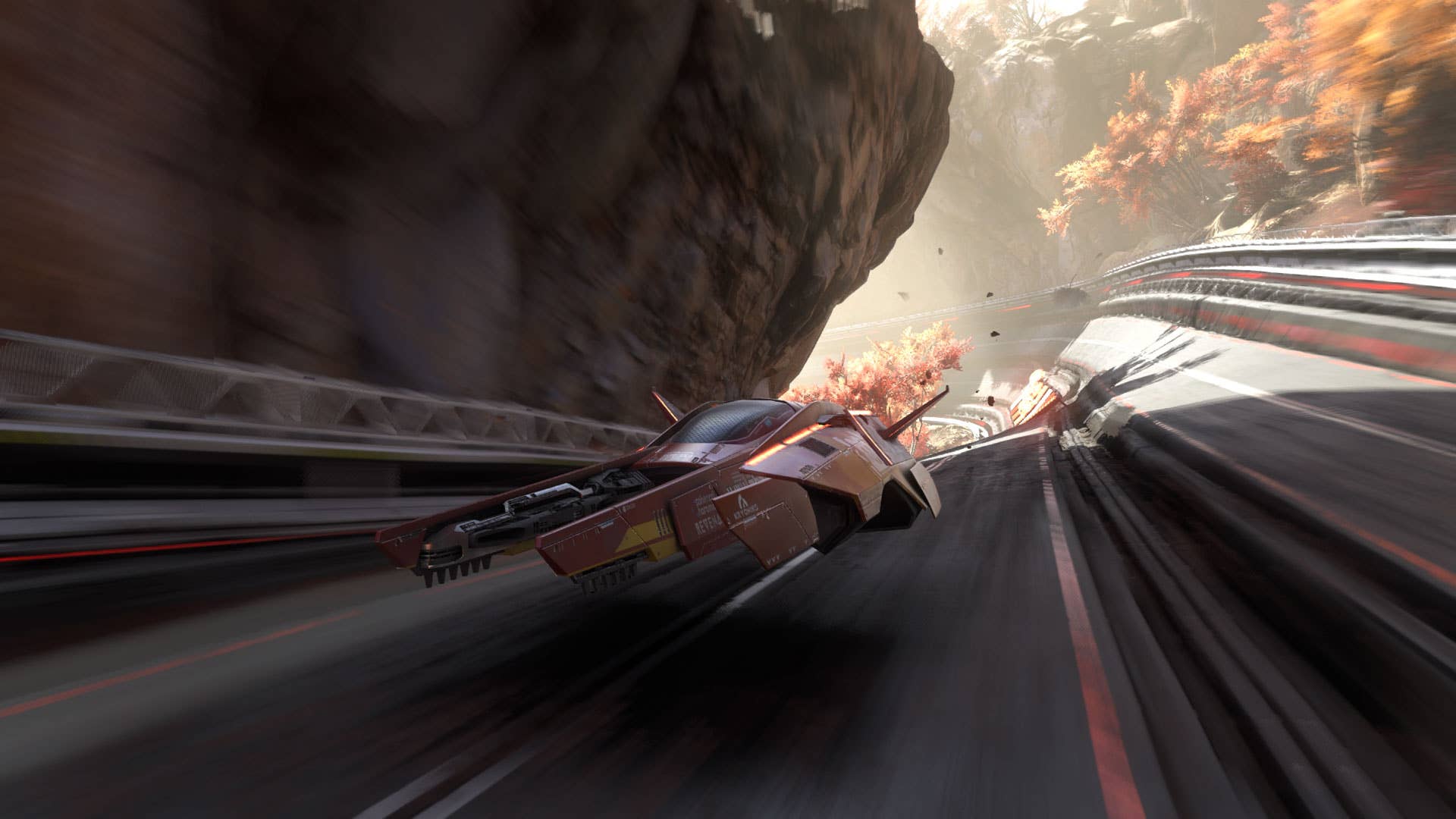 A hovering, futuristic vehicle speeds along a curved track, overhanging rock shadowing the road.