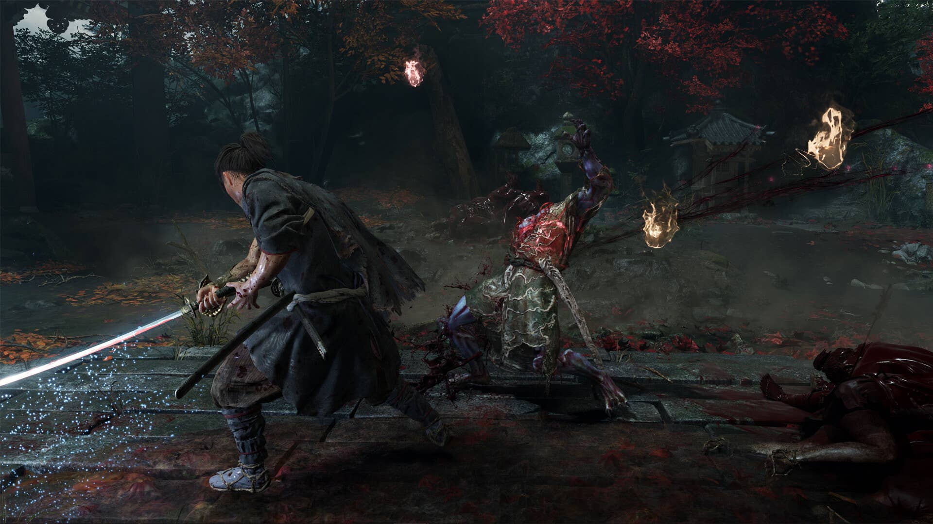 Onimusha protagonist slices a cross body chop against an enemy that is knocked backwards on his feet.