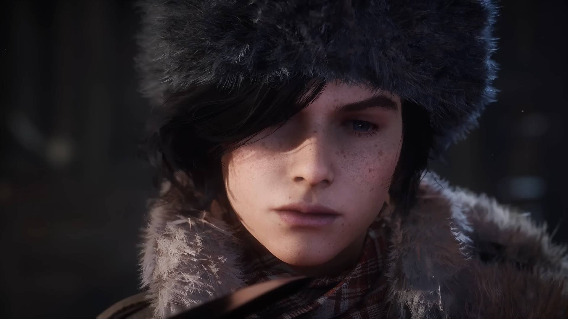 Lies of P story trailer screenshot showing close up of boy protagonist in fur hat looking down and forlorn